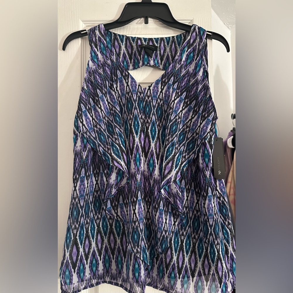 NWT AB Studio size large top. Comes from smoke, pet, and bug free home.
